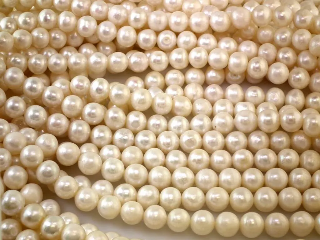 Near round loose pearl string