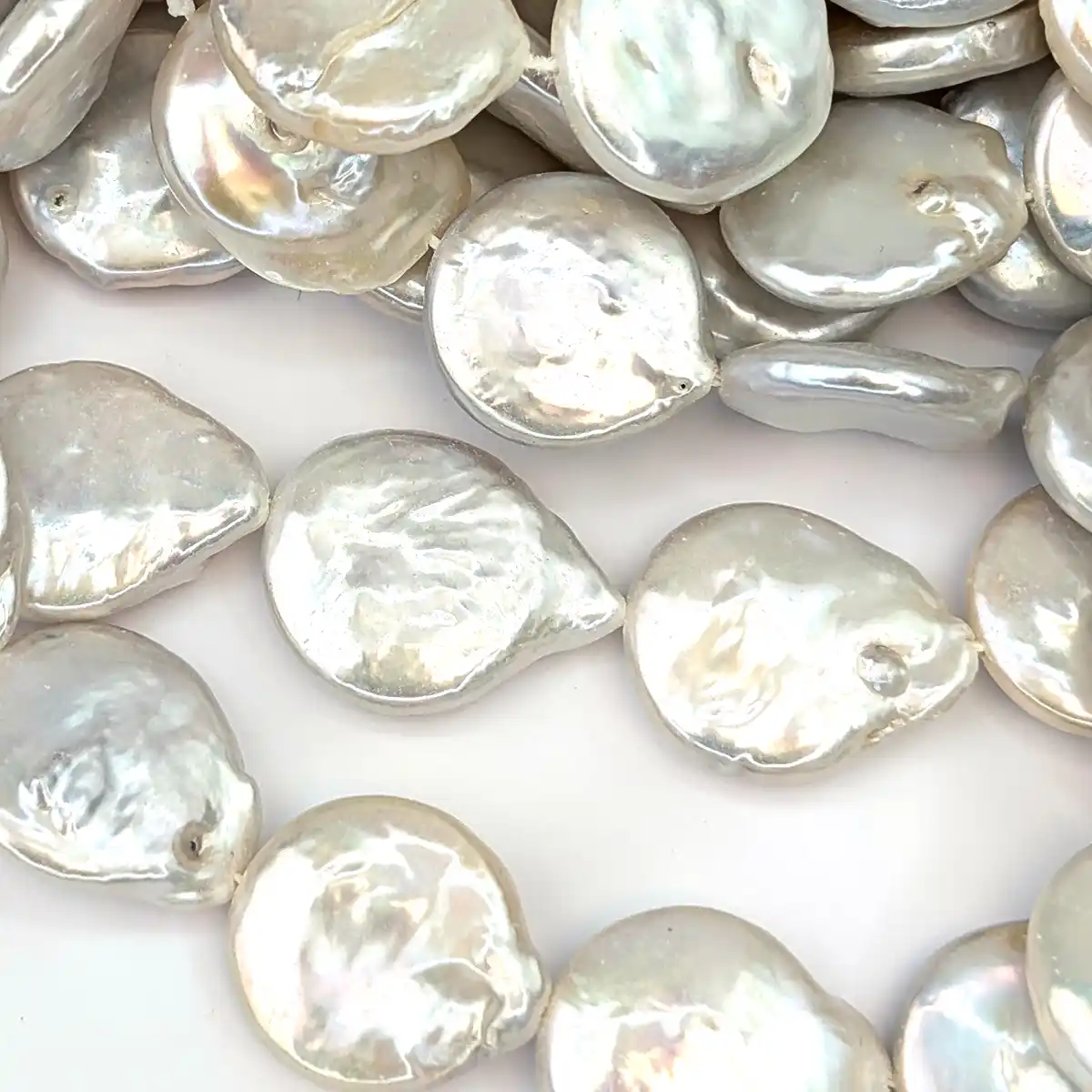 Tailed Coin Pearls with a good Lustre