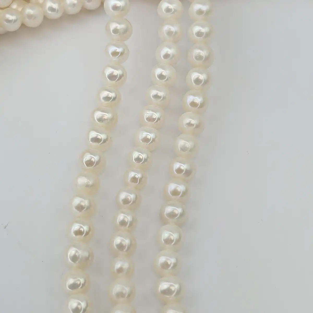 AA White Pearl String